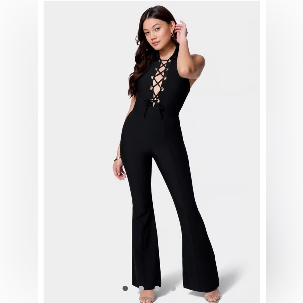 Satin, sleeveless lace-up jumpsuit for sale. Never worn.